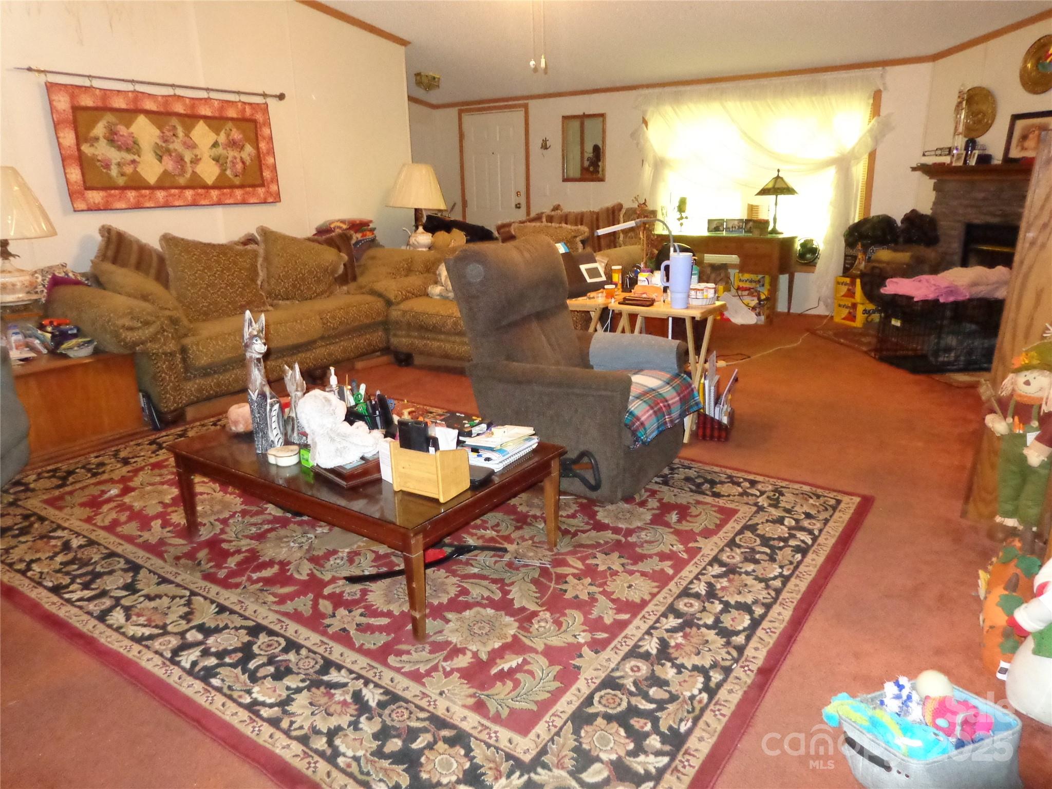 89 Blue Mountain Road Fairview, NC 28730 - Photo 25 of 40 a living room with furniture and a rug