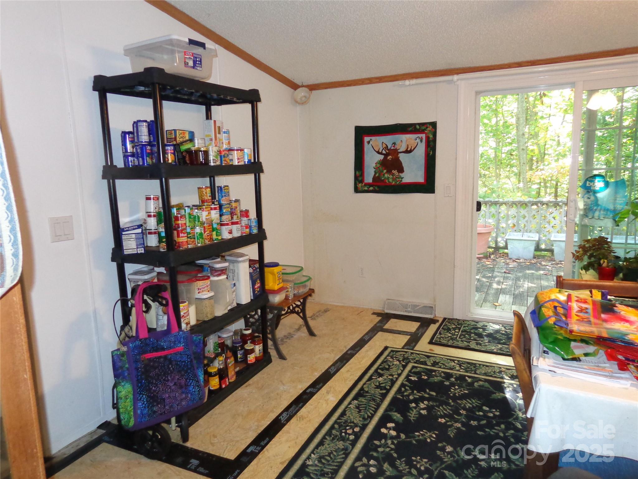 89 Blue Mountain Road Fairview, NC 28730 - Photo 37 of 40 a living room with baby toys