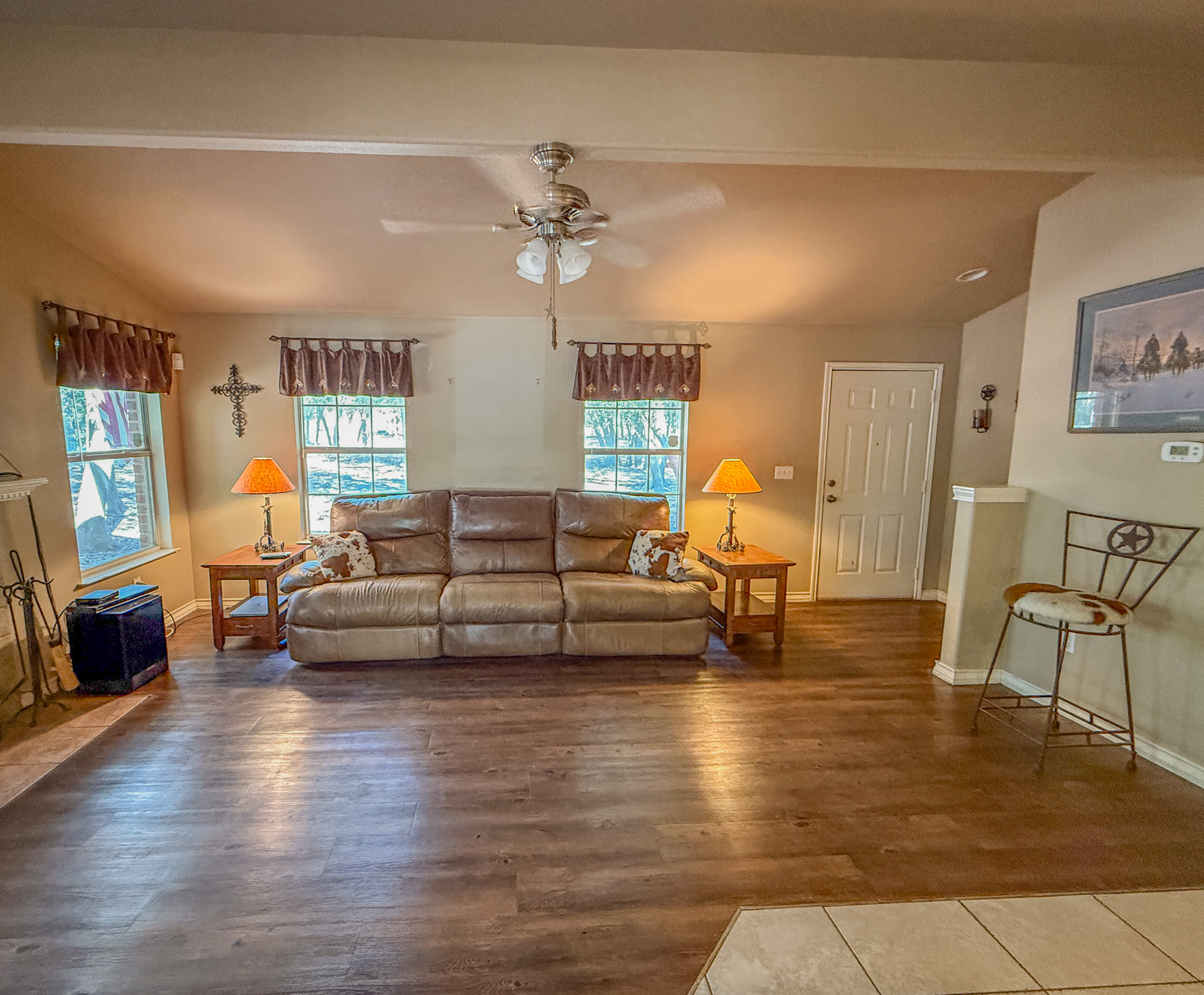 Undisclosed Address Georgetown, TX 78633 - Photo 13 of 37 a living room with furniture and a chandelier