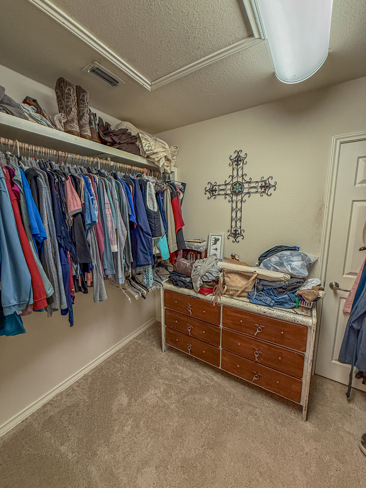 Undisclosed Address Georgetown, TX 78633 - Photo 35 of 37 a view of walk in closet with clothes