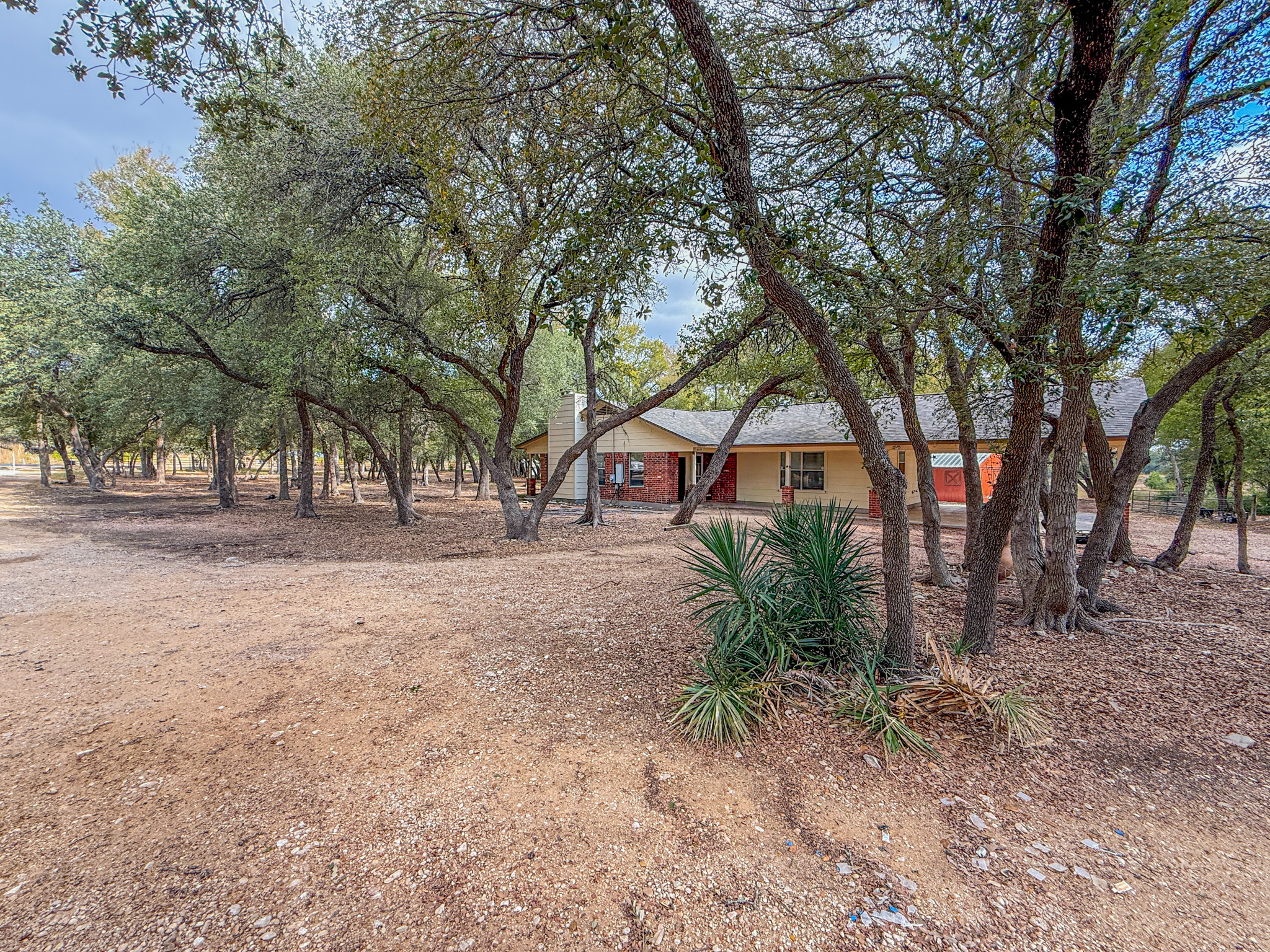 Undisclosed Address Georgetown, TX 78633 - Photo 6 of 37 a view of house with trees in the background