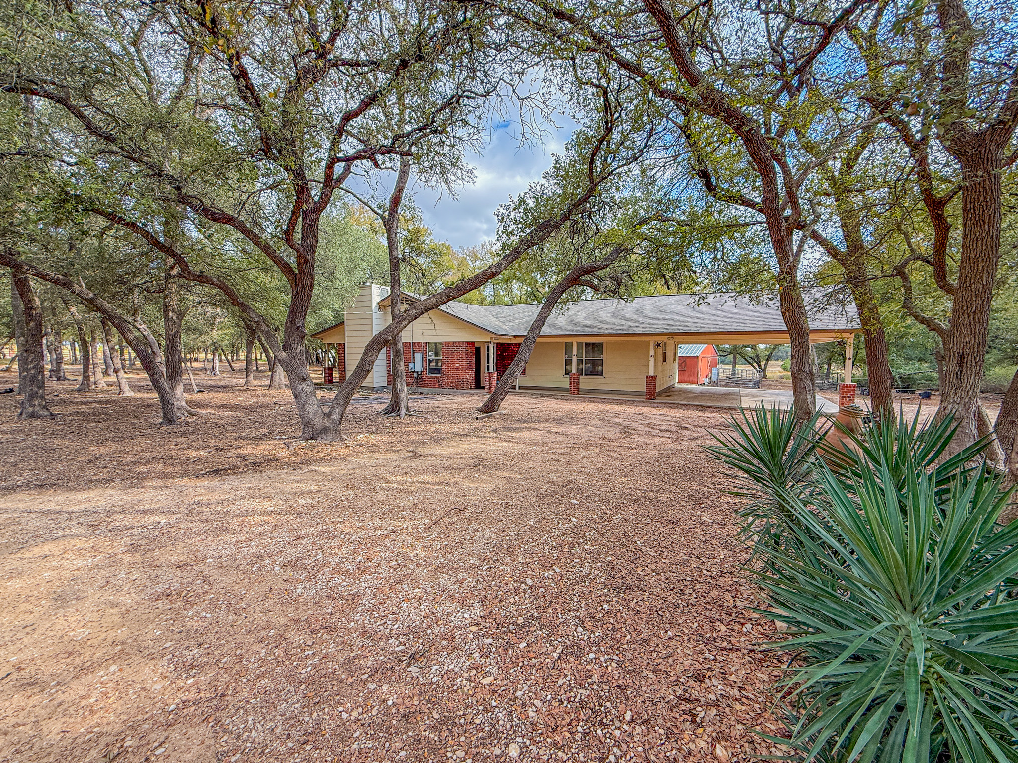 Undisclosed Address Georgetown, TX 78633 - Photo 7 of 37 a house with trees in front of it
