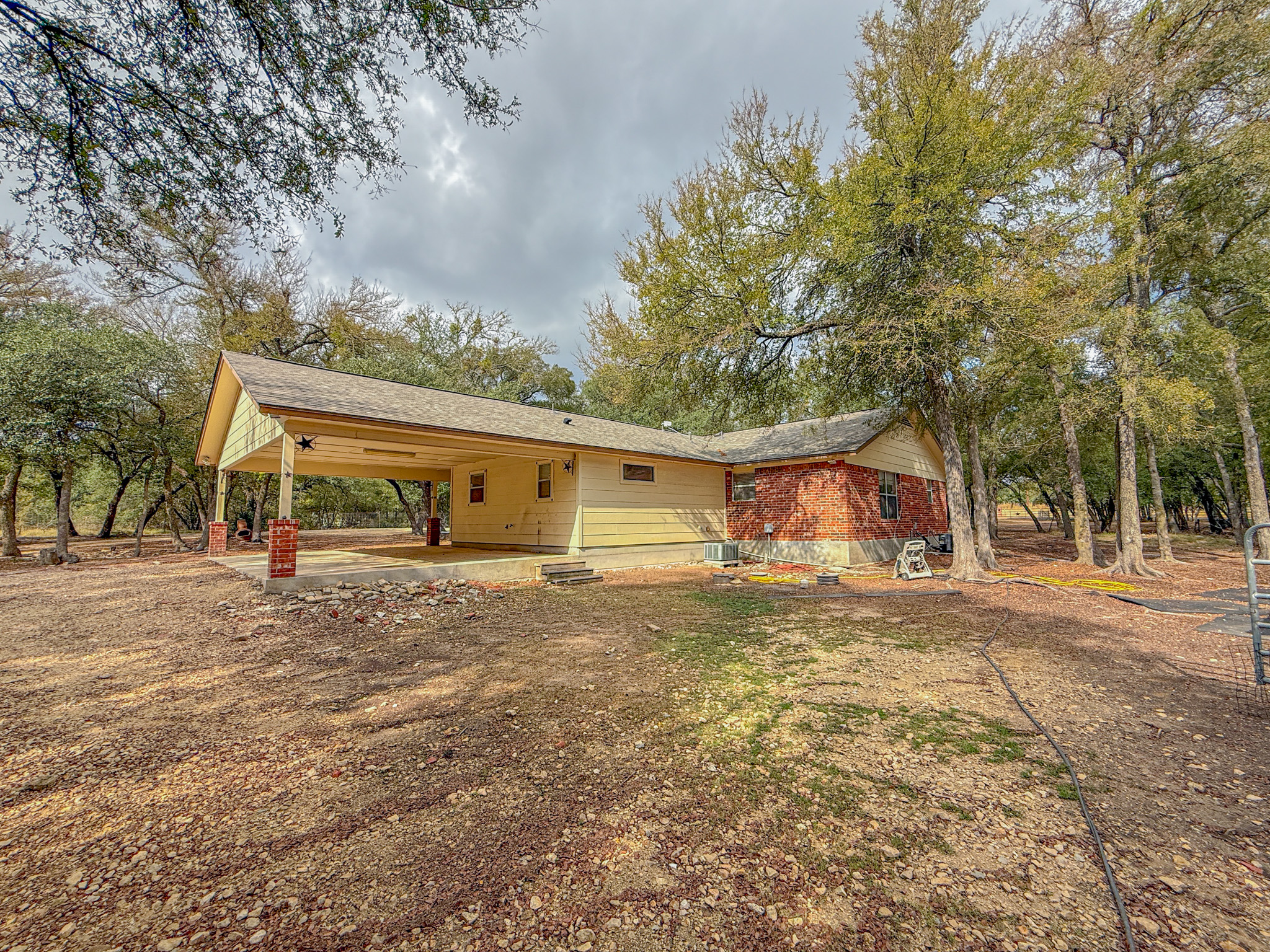 Undisclosed Address Georgetown, TX 78633 - Photo 10 of 37 a view of a house with a yard