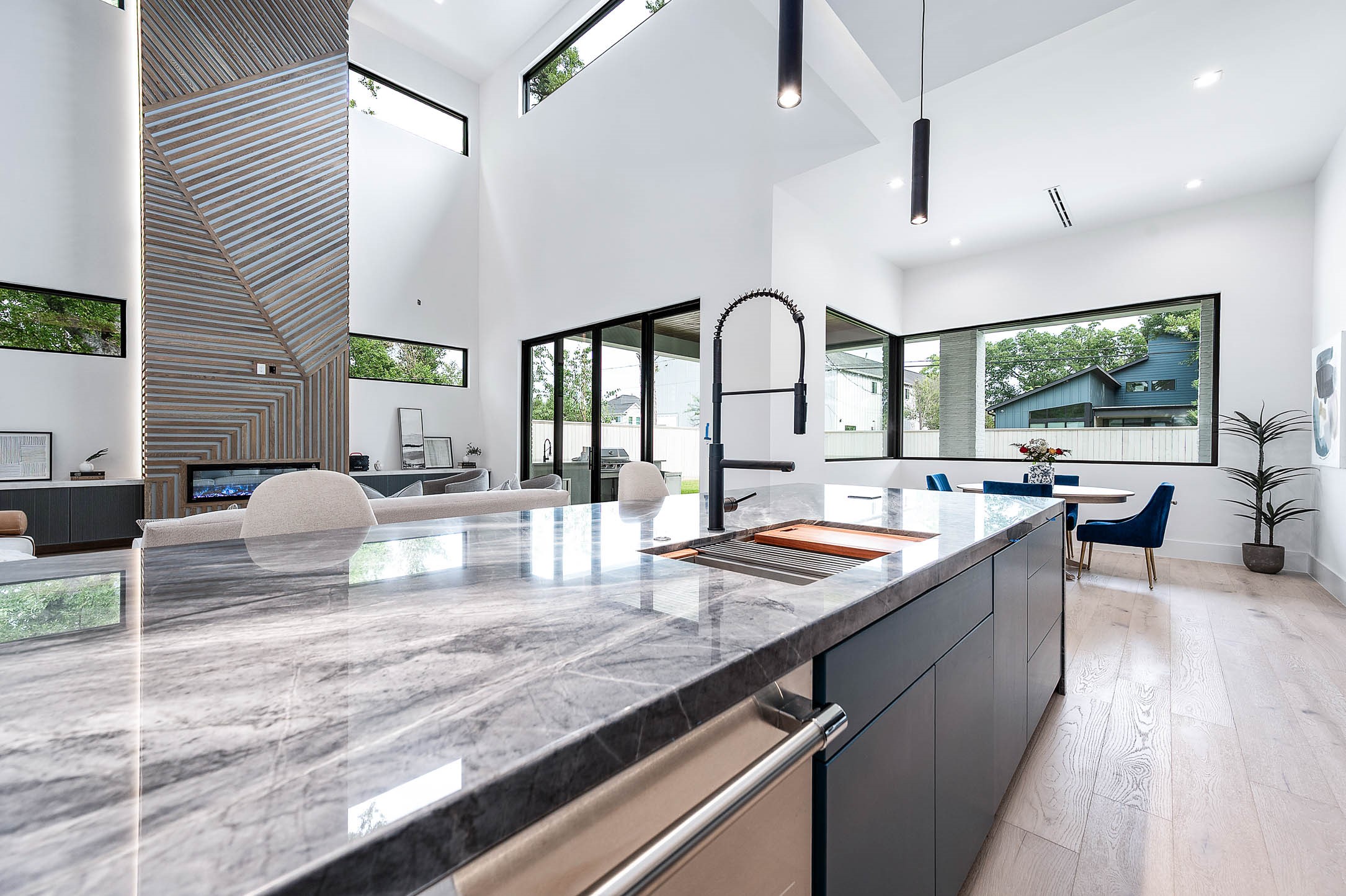 207 West 33rd Street Houston, TX 77018 - Photo 13 of 50 Kitchen open to the living space, designed for seamless entertaining with a spacious layout that encourages socializing and flow between areas.