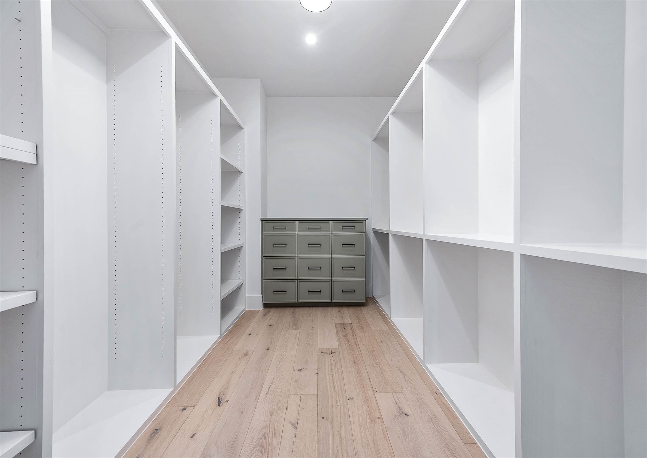 207 West 33rd Street Houston, TX 77018 - Photo 37 of 50 Large custom closets thoughtfully designed throughout the home, offering ample storage and organization space.