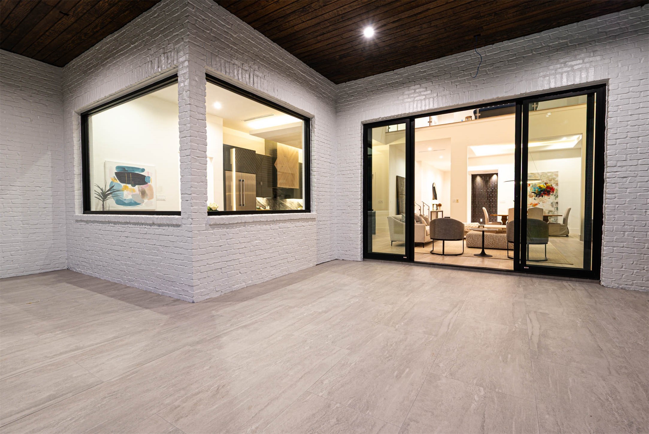 207 West 33rd Street Houston, TX 77018 - Photo 47 of 50 Outdoor living space features a 12-foot sliding glass doors.