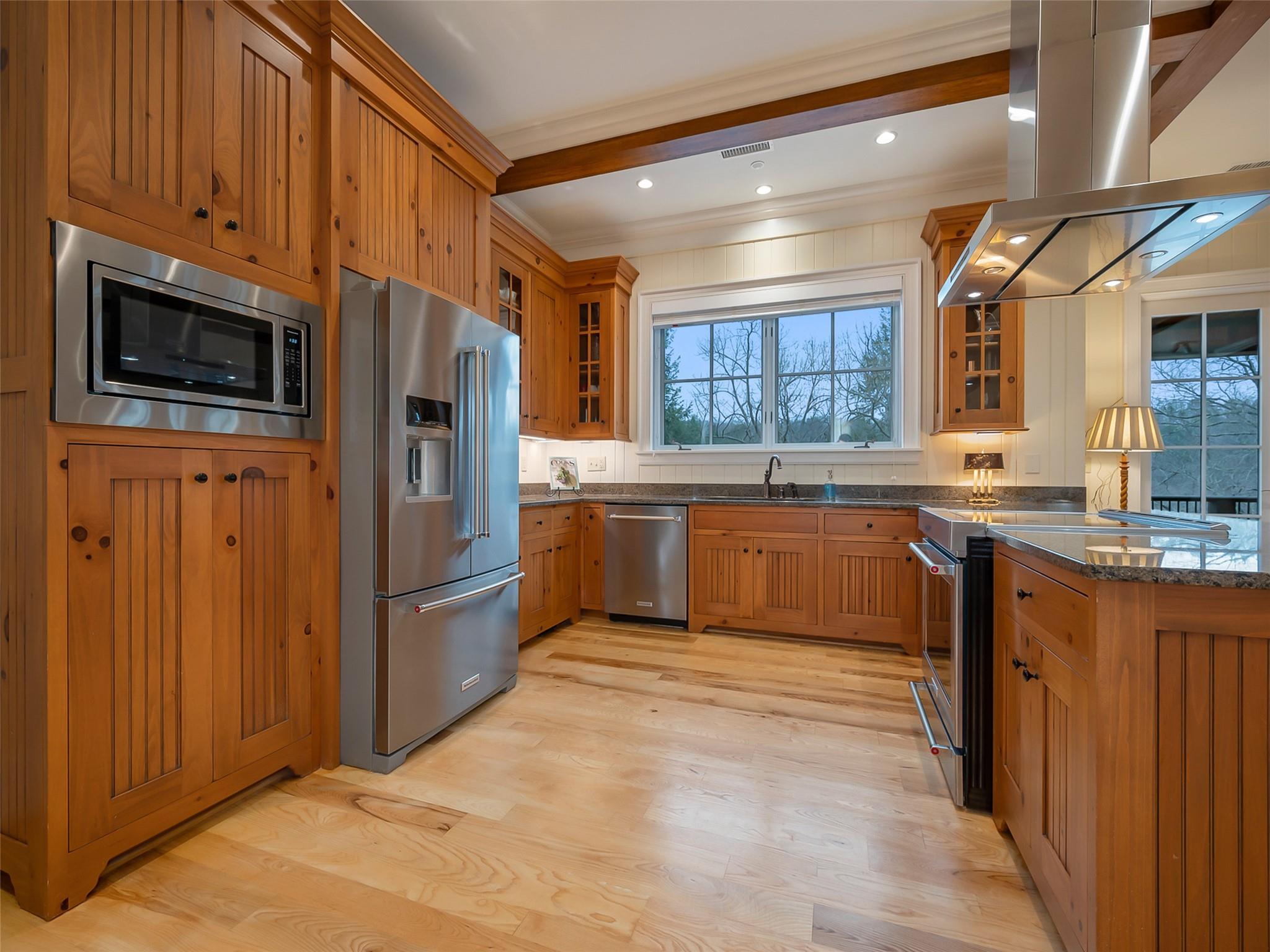 275 Clubhouse, Unit C301 Mill Spring, NC 28756 - Photo 11 of 41 a kitchen with stainless steel appliances granite countertop a stove sink and cabinets