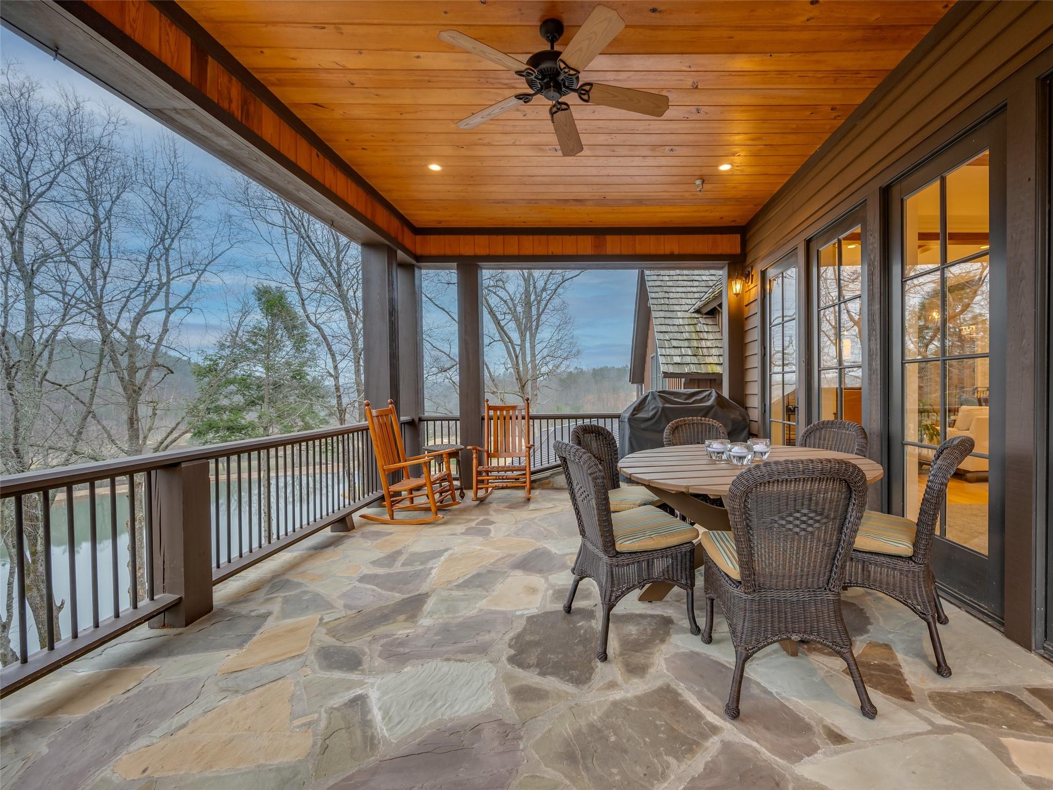 275 Clubhouse, Unit C301 Mill Spring, NC 28756 - Photo 14 of 41 a dining room with furniture water view and balcony