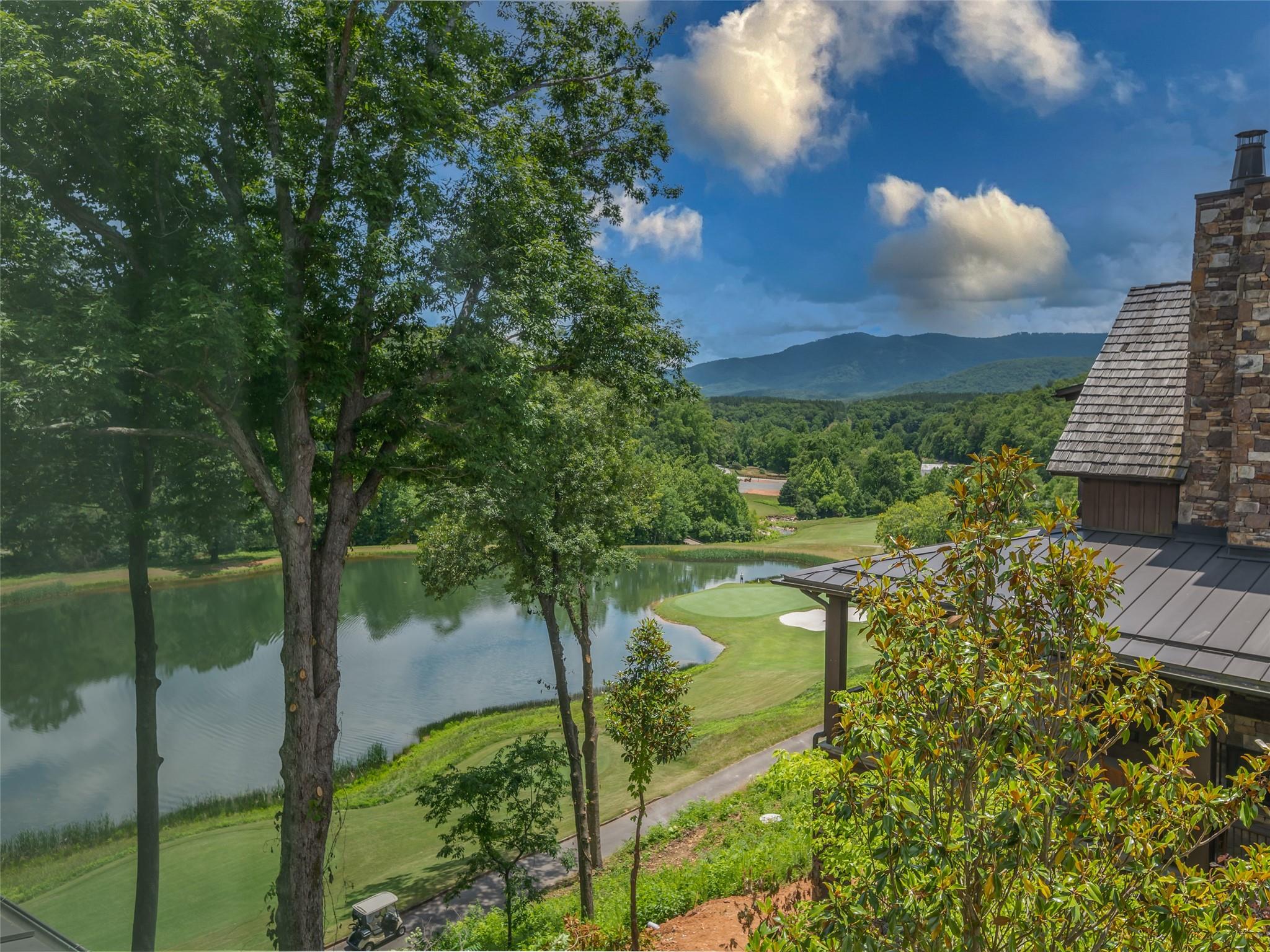 275 Clubhouse, Unit C301 Mill Spring, NC 28756 - Photo 18 of 41 a view of a lake in the apartment