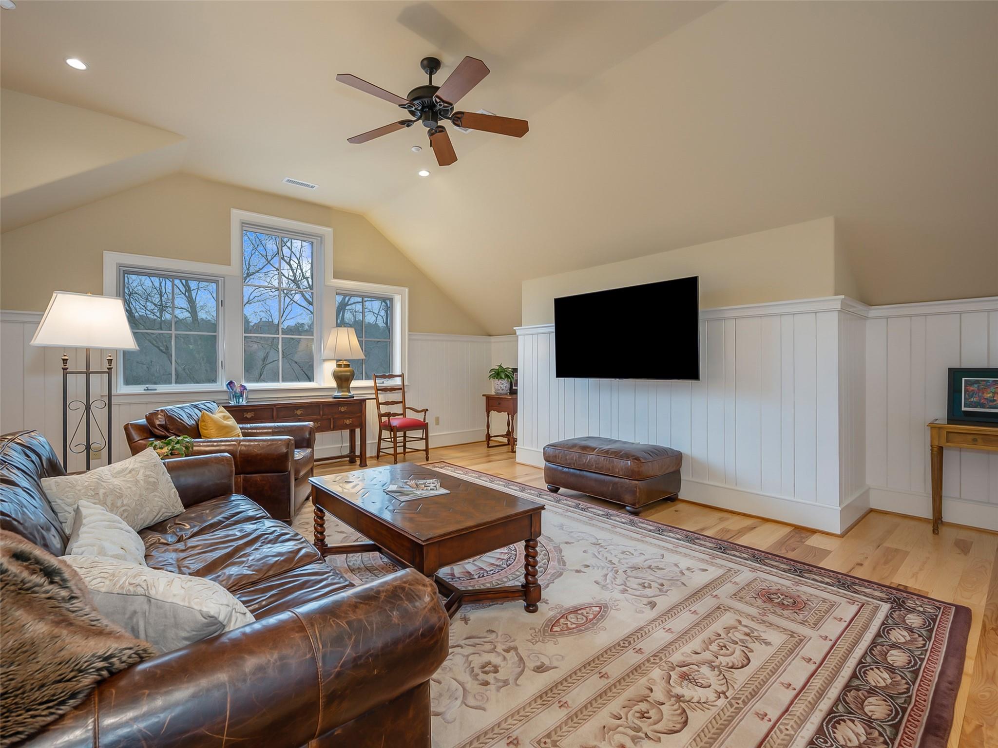 275 Clubhouse, Unit C301 Mill Spring, NC 28756 - Photo 20 of 41 a living room with furniture and a flat screen tv