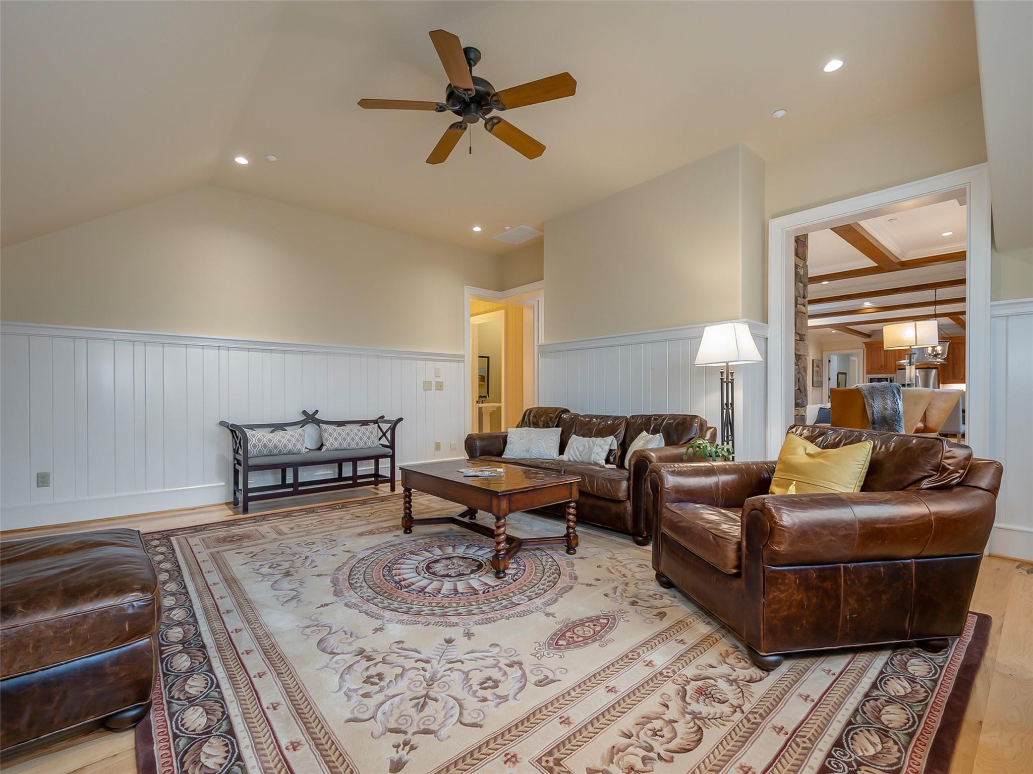 275 Clubhouse, Unit C301 Mill Spring, NC 28756 - Photo 21 of 41 a living room with furniture and a wooden floor