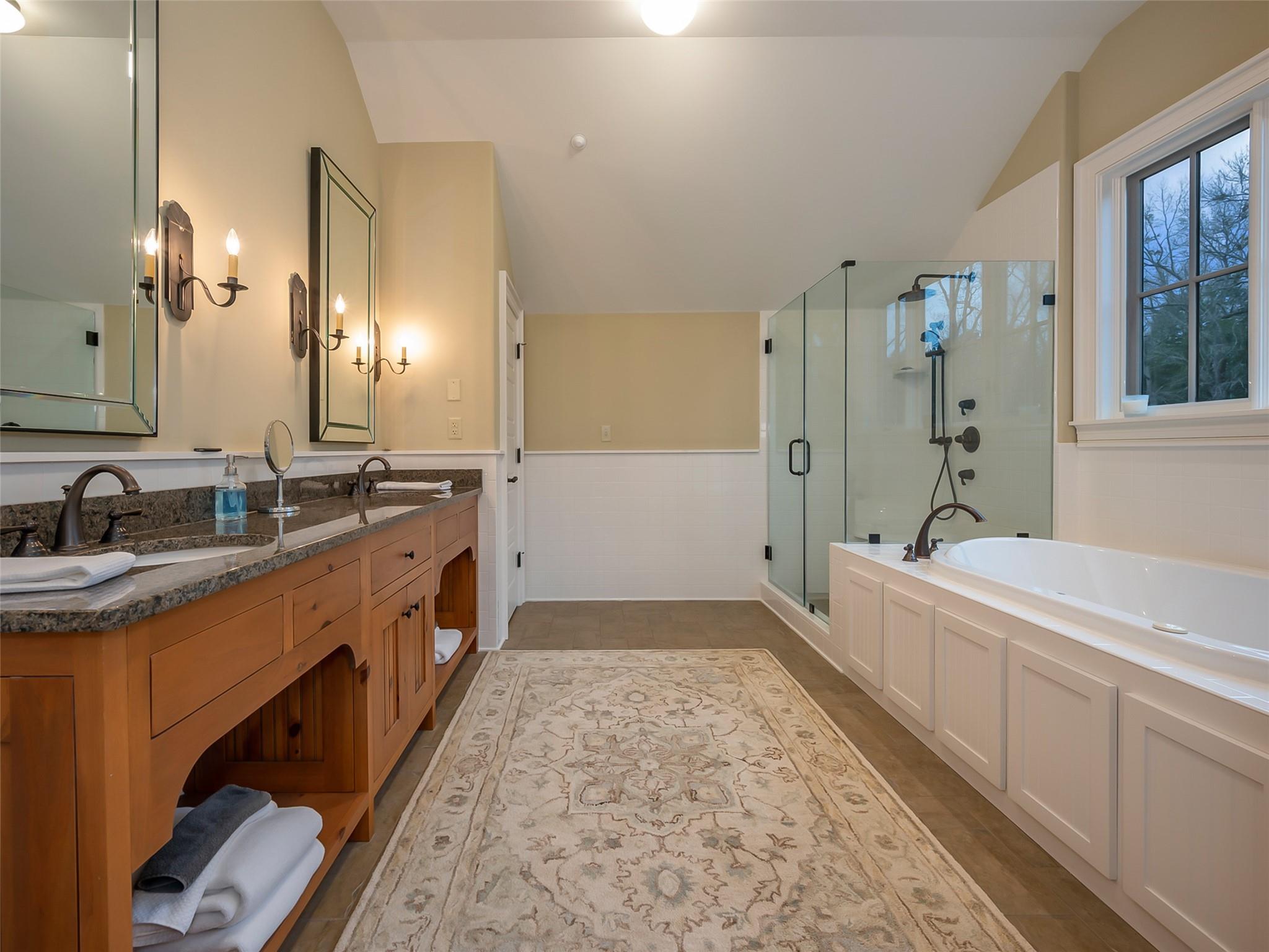 275 Clubhouse, Unit C301 Mill Spring, NC 28756 - Photo 25 of 41 a bathroom with a tub sink and mirror