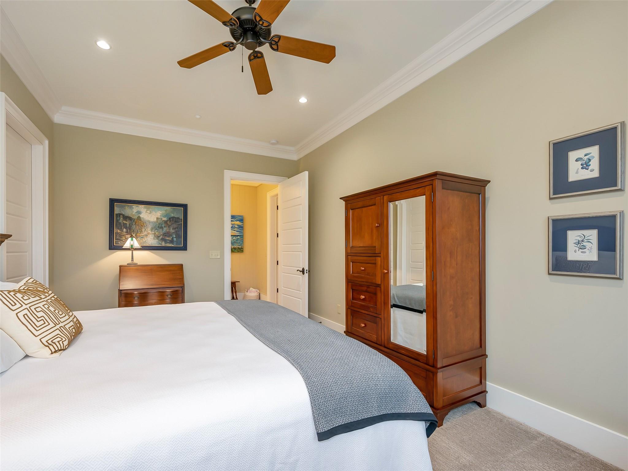 275 Clubhouse, Unit C301 Mill Spring, NC 28756 - Photo 30 of 41 a bedroom with a large bed and a chandelier