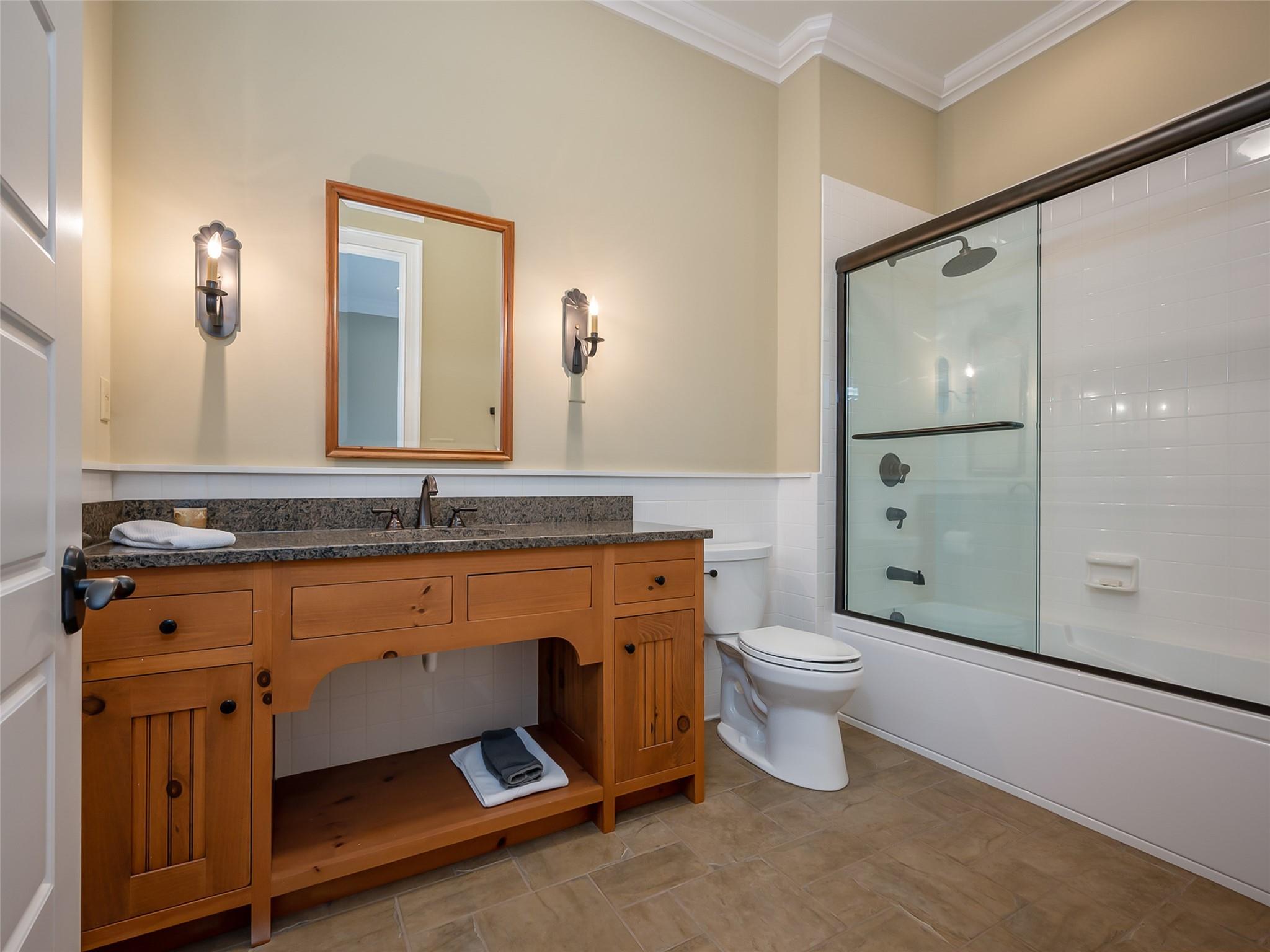 275 Clubhouse, Unit C301 Mill Spring, NC 28756 - Photo 35 of 41 a bathroom with a sink a toilet and shower