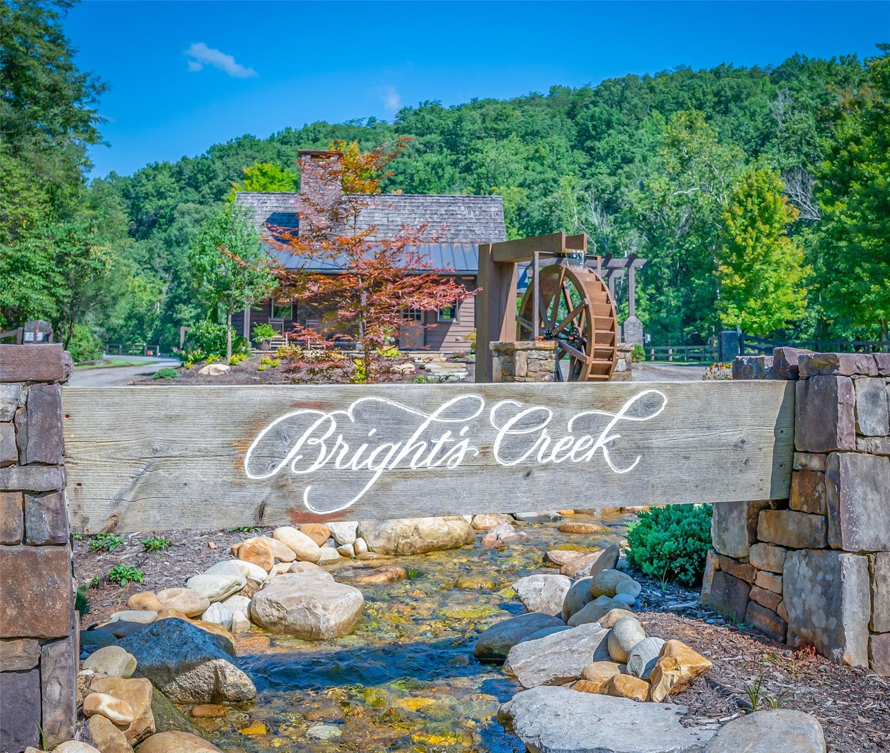 275 Clubhouse, Unit C301 Mill Spring, NC 28756 - Photo 40 of 41 view of outdoor space with signage and flags