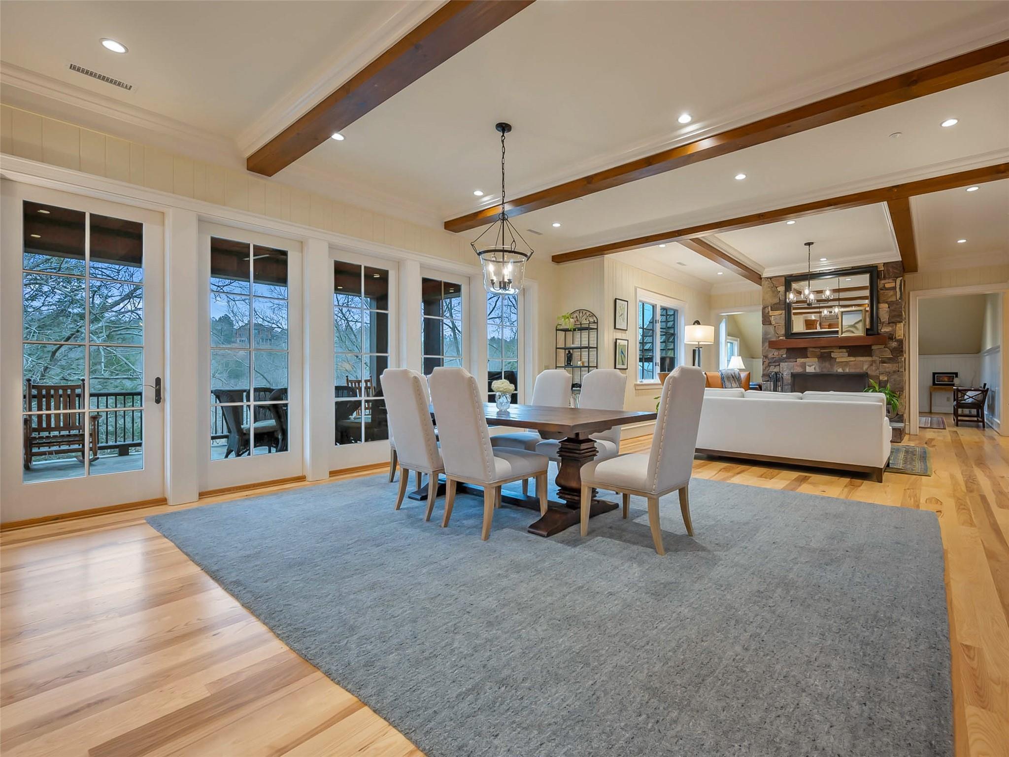 275 Clubhouse, Unit C301 Mill Spring, NC 28756 - Photo 5 of 41 a view of a dining room with furniture window and wooden floor