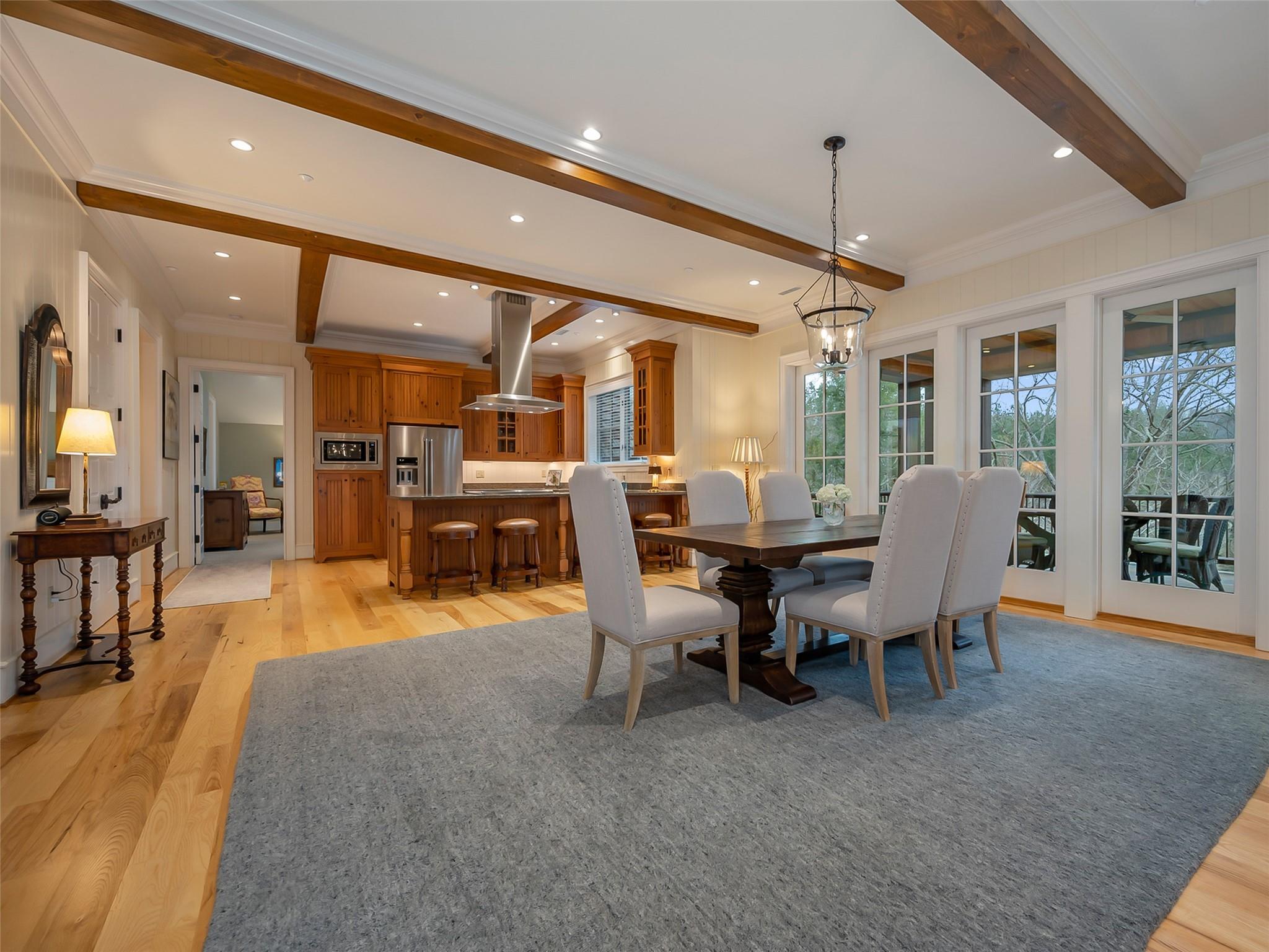 275 Clubhouse, Unit C301 Mill Spring, NC 28756 - Photo 6 of 41 a view of a dining room with furniture window and wooden floor