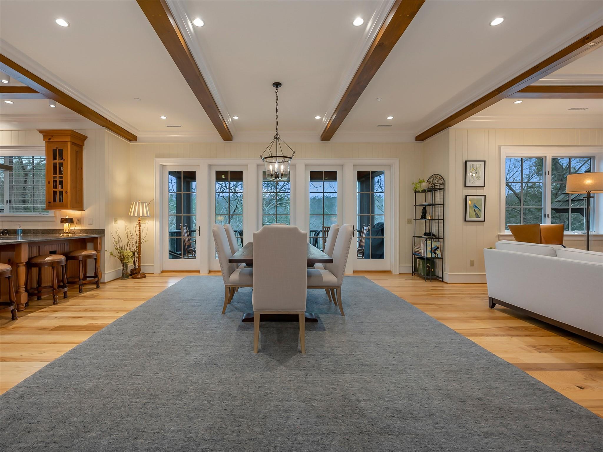 275 Clubhouse, Unit C301 Mill Spring, NC 28756 - Photo 7 of 41 a living room with furniture and a dining table with wooden floor