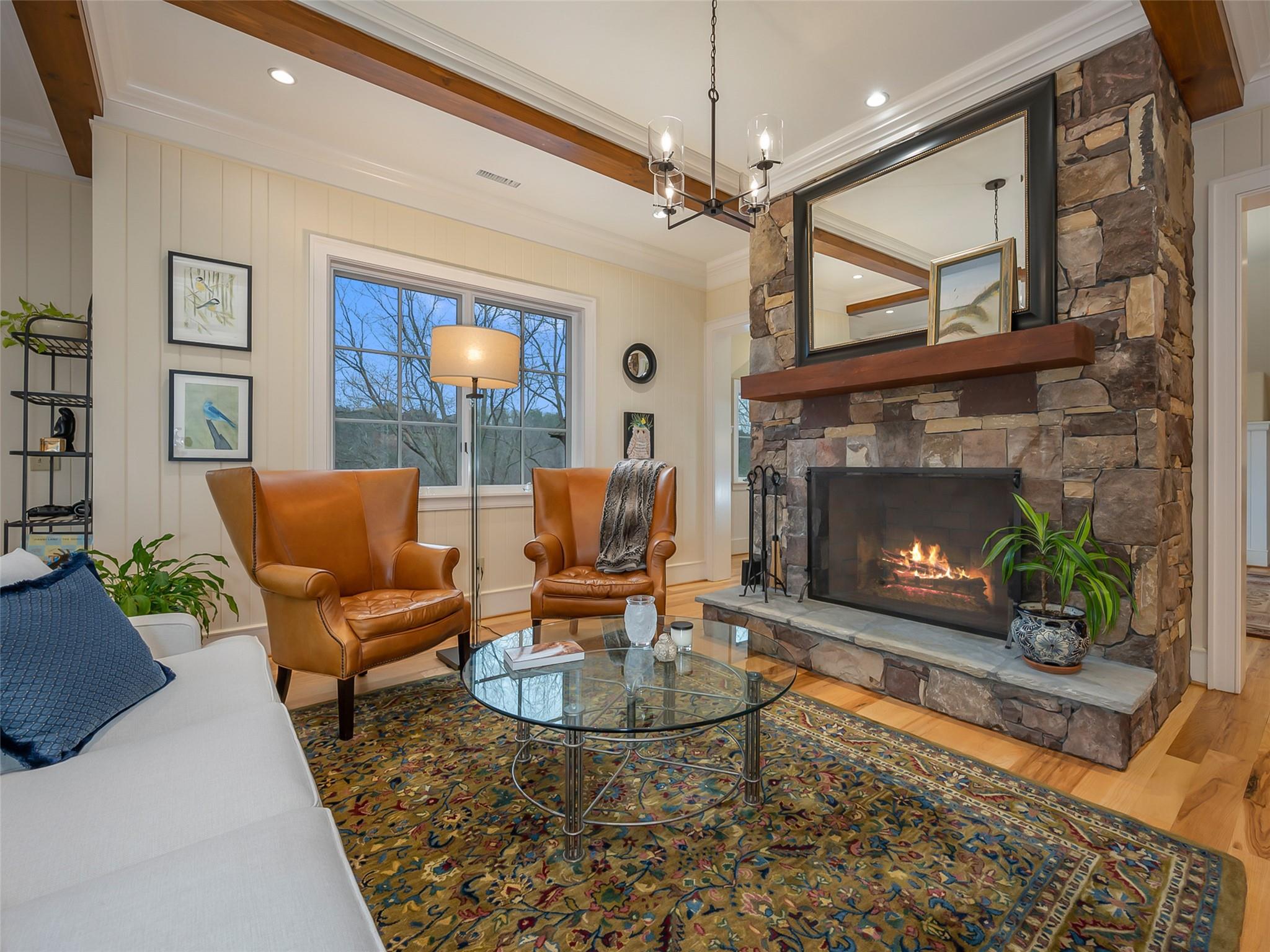 275 Clubhouse, Unit C301 Mill Spring, NC 28756 - Photo 8 of 41 a living room with furniture a window and a fireplace