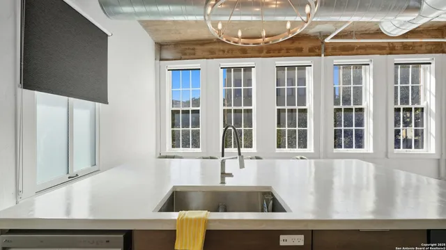 a front view of a house with car parked