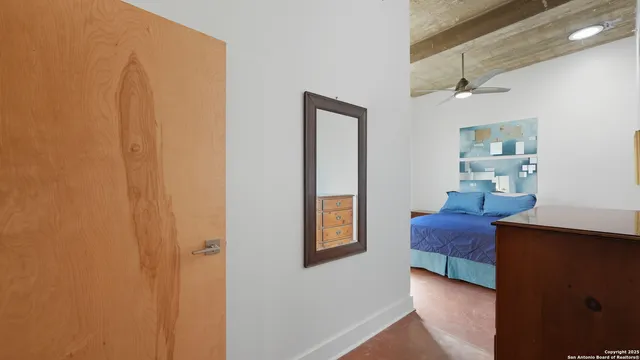 a workspace with furniture and wooden floor