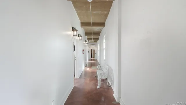 a view of hallway with stairs