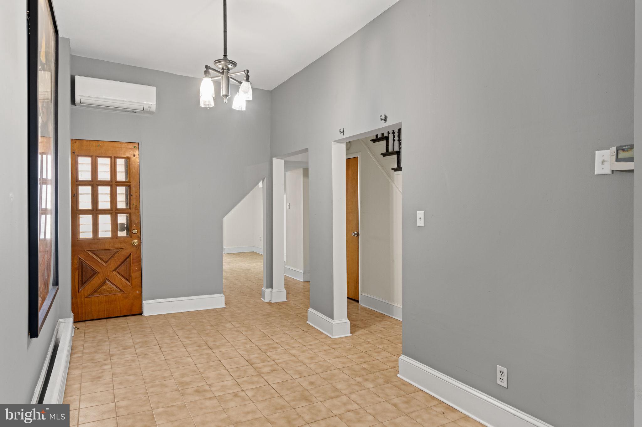 3633 Warren Street Philadelphia, PA 19104 - Photo 11 of 38 a view of a livingroom with a chandelier