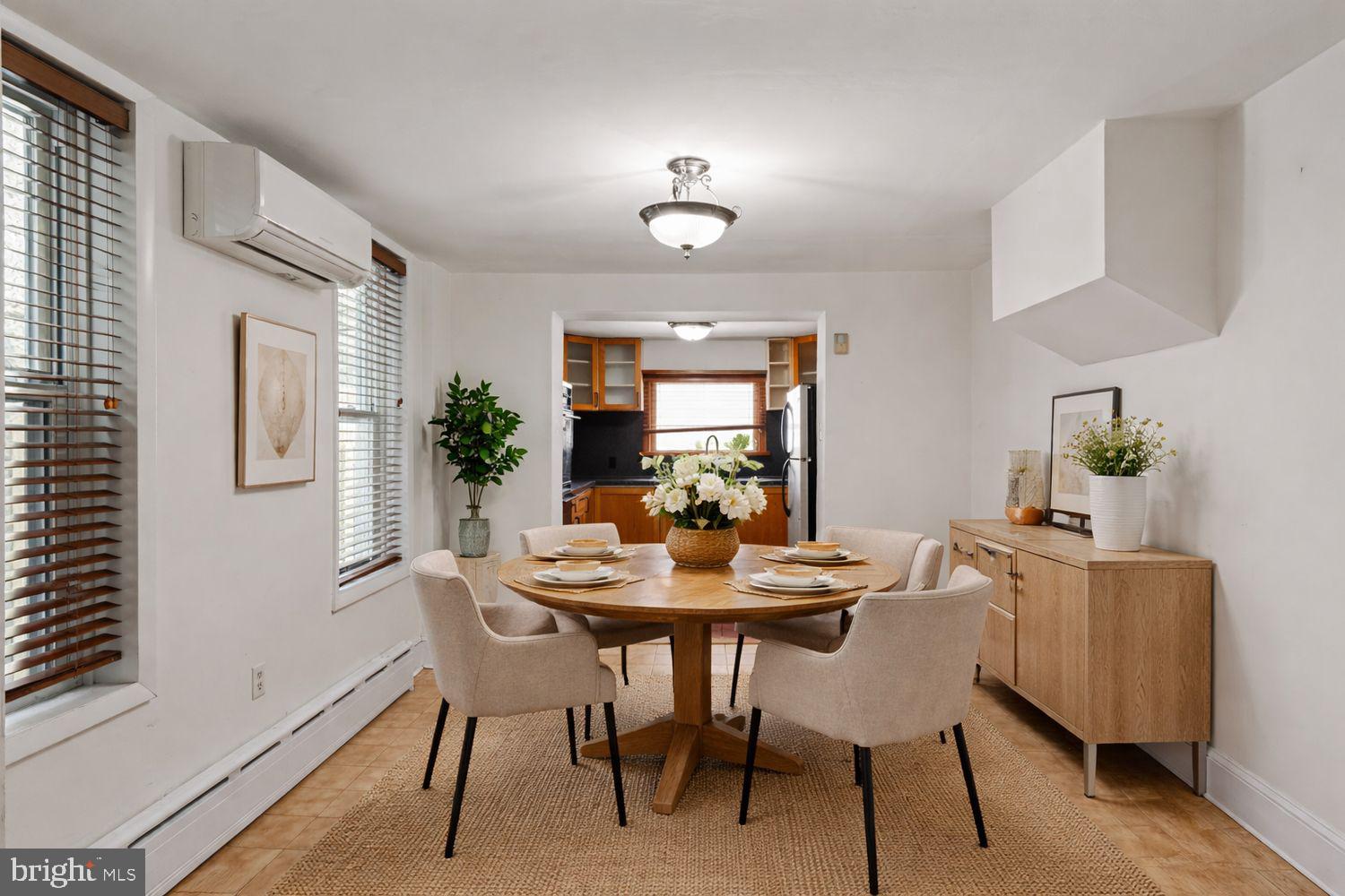 3633 Warren Street Philadelphia, PA 19104 - Photo 13 of 38 a view of a dining room with furniture window and wooden floor