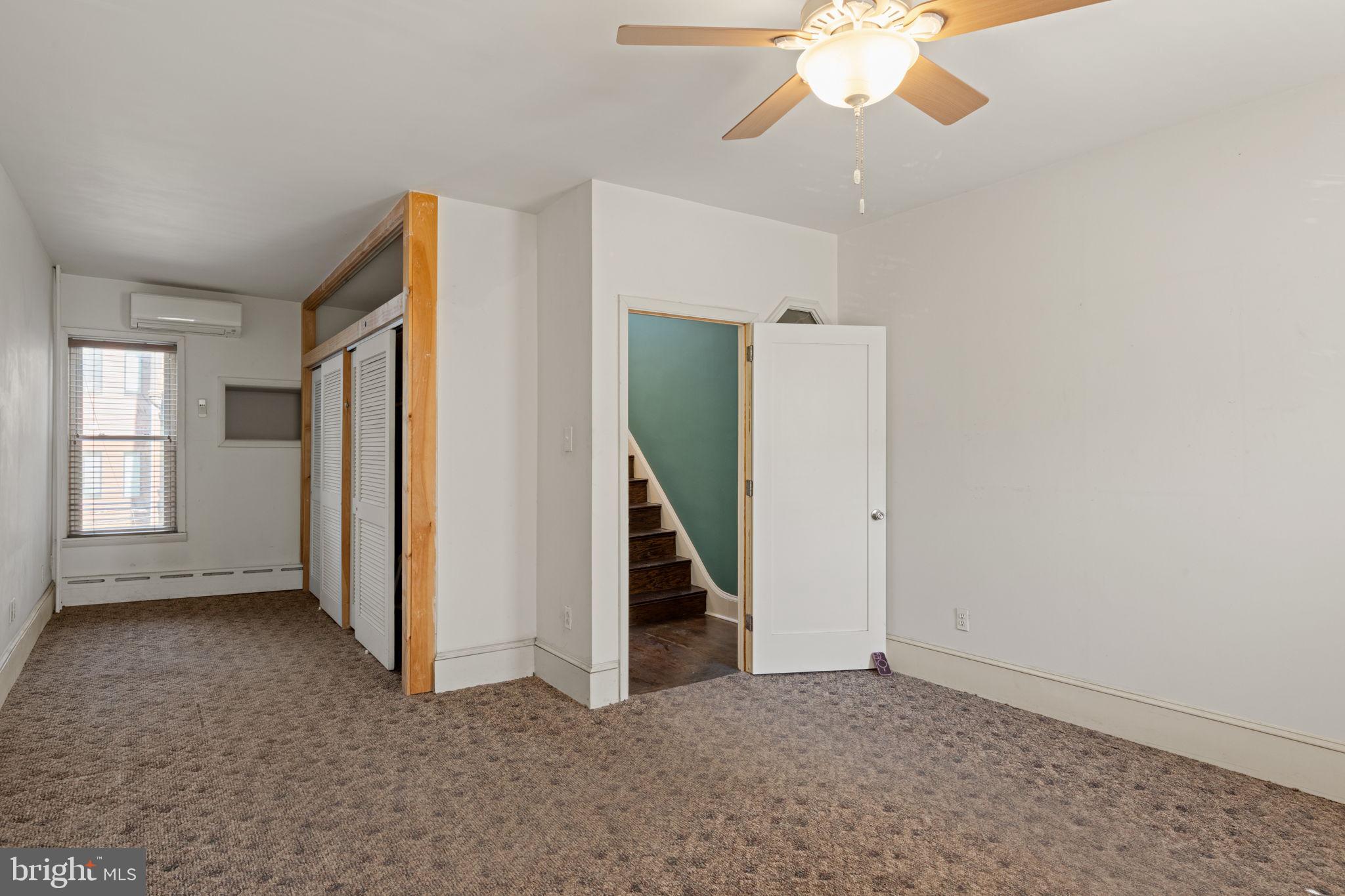 3633 Warren Street Philadelphia, PA 19104 - Photo 23 of 38 wooden floor in an empty room with a window