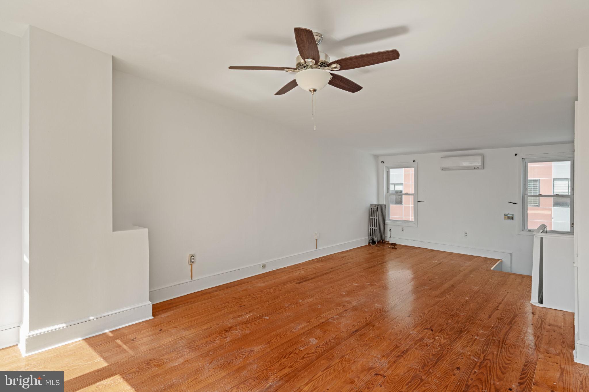 3633 Warren Street Philadelphia, PA 19104 - Photo 35 of 38 wooden floor in an empty room with a window