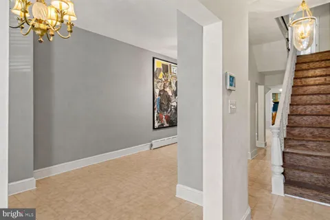 a view of a hallway with entryway