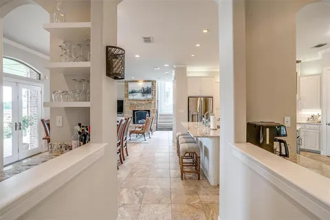a view of a kitchen and dining area