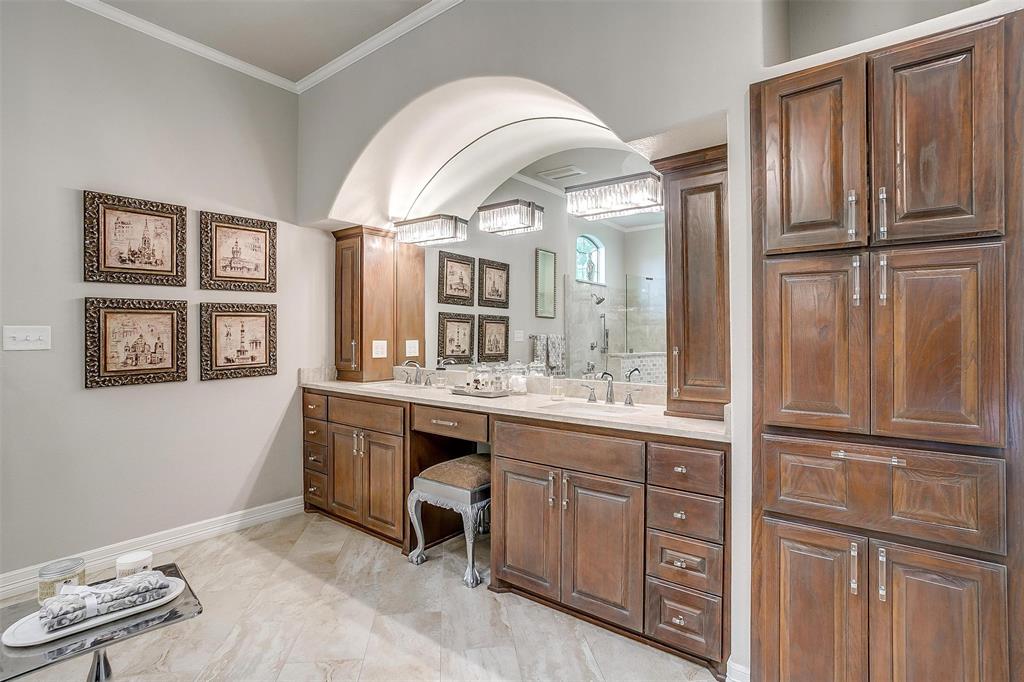173 Trinity Bluffs Road Aledo, TX 76008 - Photo 34 of 40 a spacious bathroom with a granite countertop sink and a mirror