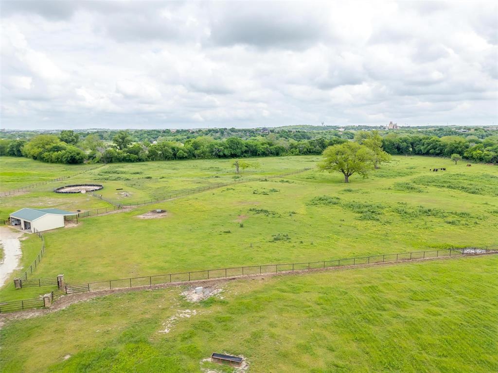 173 Trinity Bluffs Road Aledo, TX 76008 - Photo 4 of 40 a view of an ocean from a yard