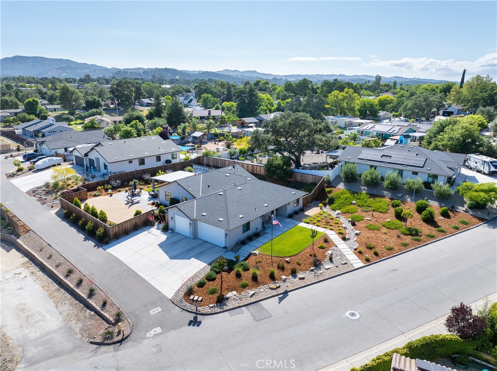 8550 El Corte Road Atascadero, CA 93422 - Photo 11 of 72 an aerial view of a swimming pool patio and mountain view