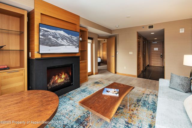 a living room with a fireplace