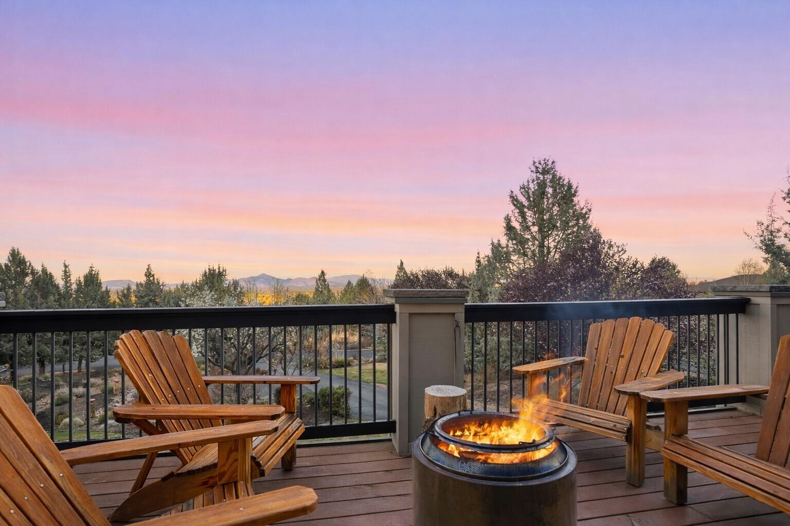 631 Sundance Ridge Court Redmond, OR 97756 - Photo 17 of 61 a view of a balcony with two chairs and a deck