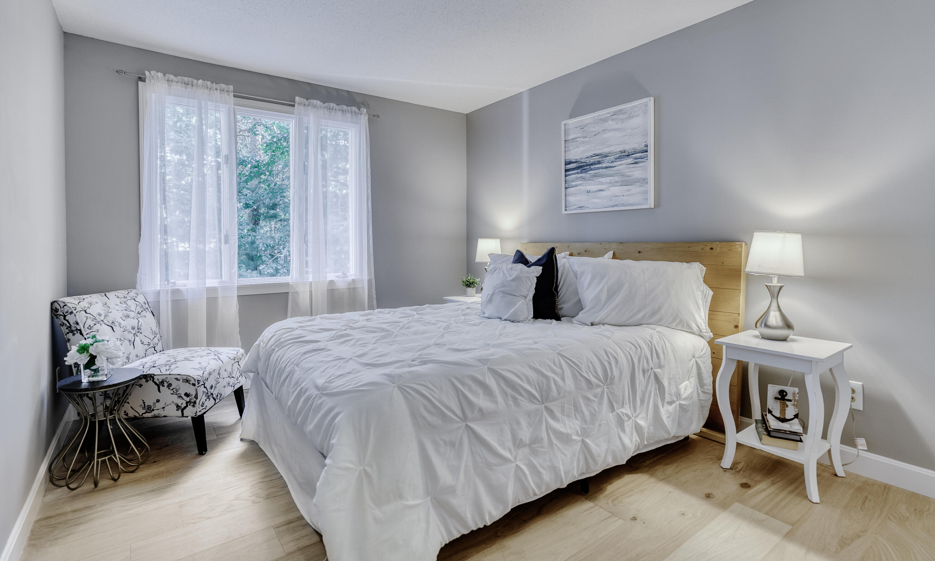 32 Sandy Reach Teaticket, MA 02536 - Photo 15 of 25 a bedroom with a bed and a large window