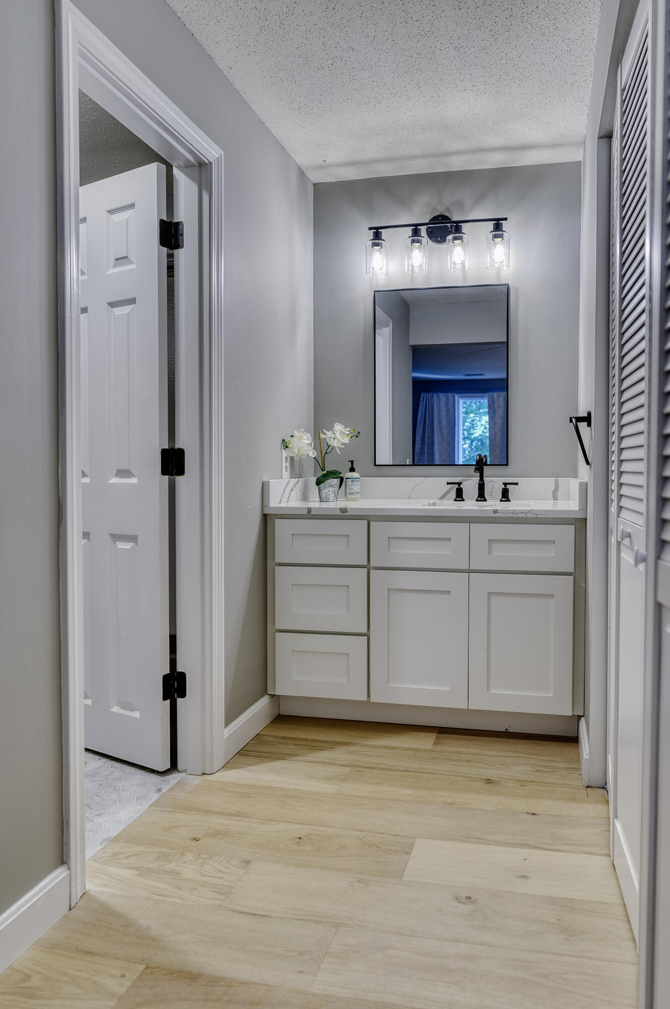 32 Sandy Reach Teaticket, MA 02536 - Photo 17 of 25 a bathroom with a double vanity sink mirror and