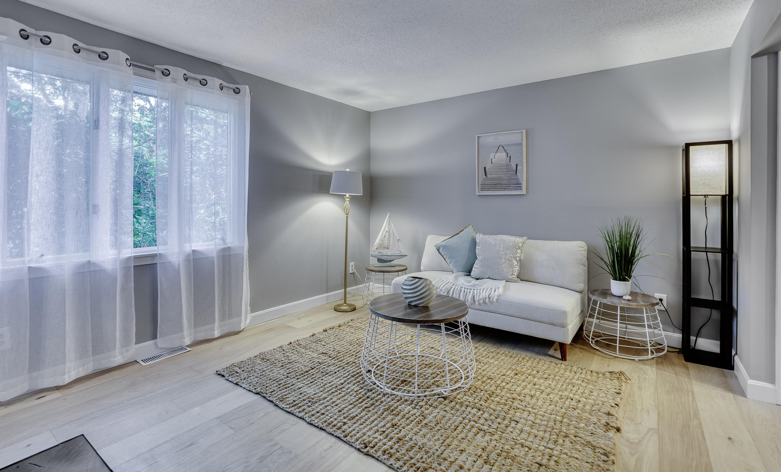 32 Sandy Reach Teaticket, MA 02536 - Photo 10 of 25 a living room with furniture and a large window