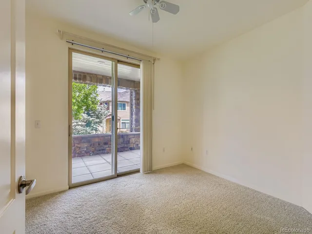 a view of a lake with a house in the background