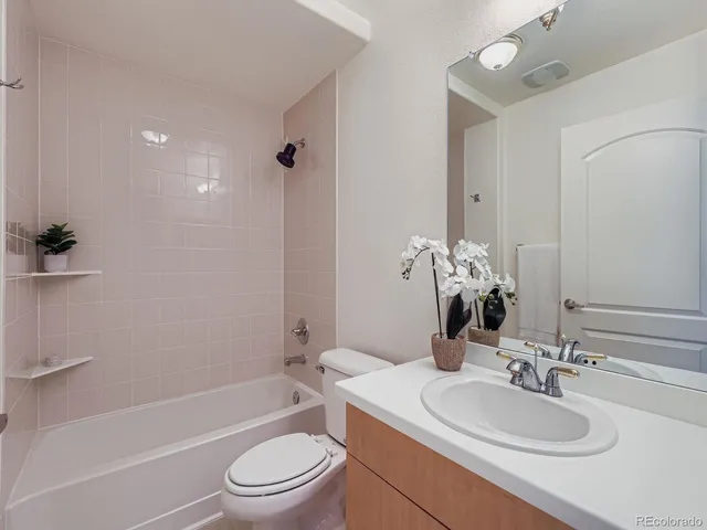 a front view of a house with swimming pool yard and outdoor seating