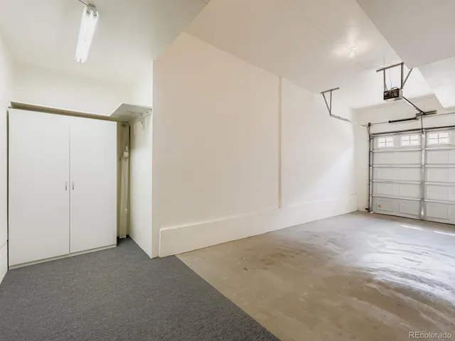 a view of a swimming pool with lounge chairs