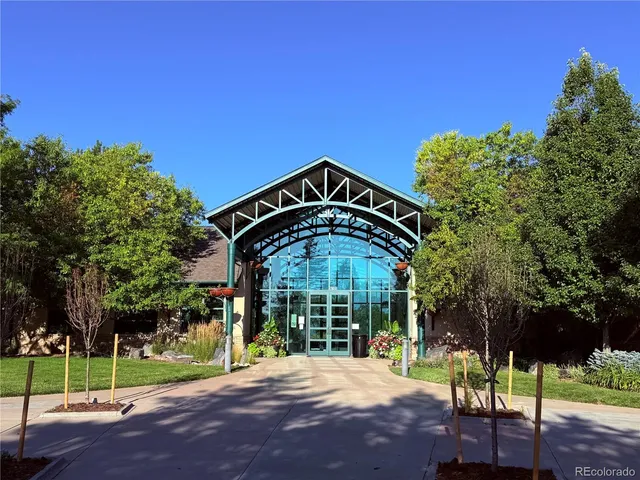 a view of a lake with outdoor seating