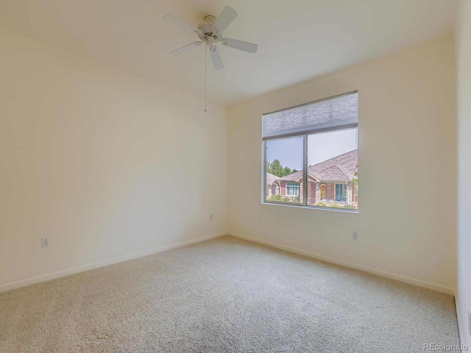 8578 Gold Peak Drive, Unit D Highlands Ranch, CO 80130 - Photo 9 of 50 an empty room with a window