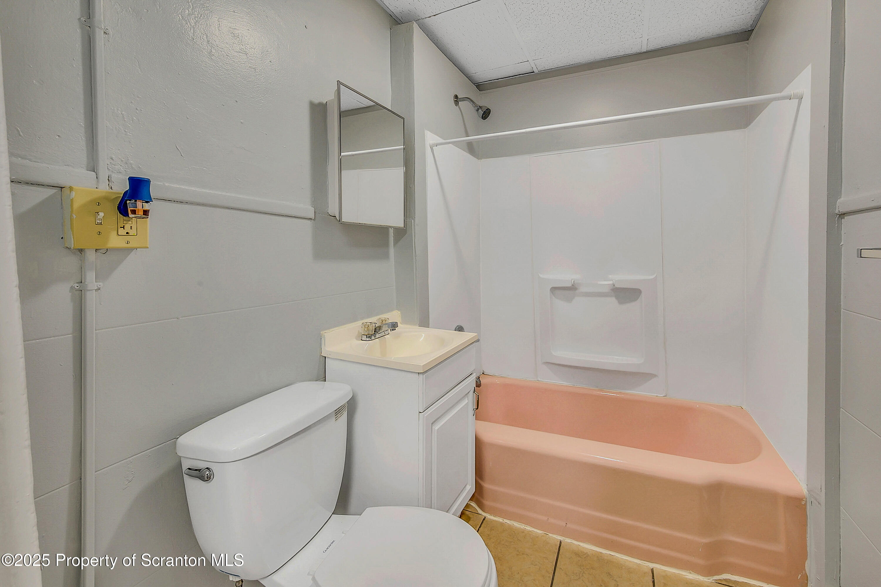 1007 Washburn Street, Unit 1 Scranton, PA 18504 - Photo 12 of 14 a bathroom with a toilet and a bathtub