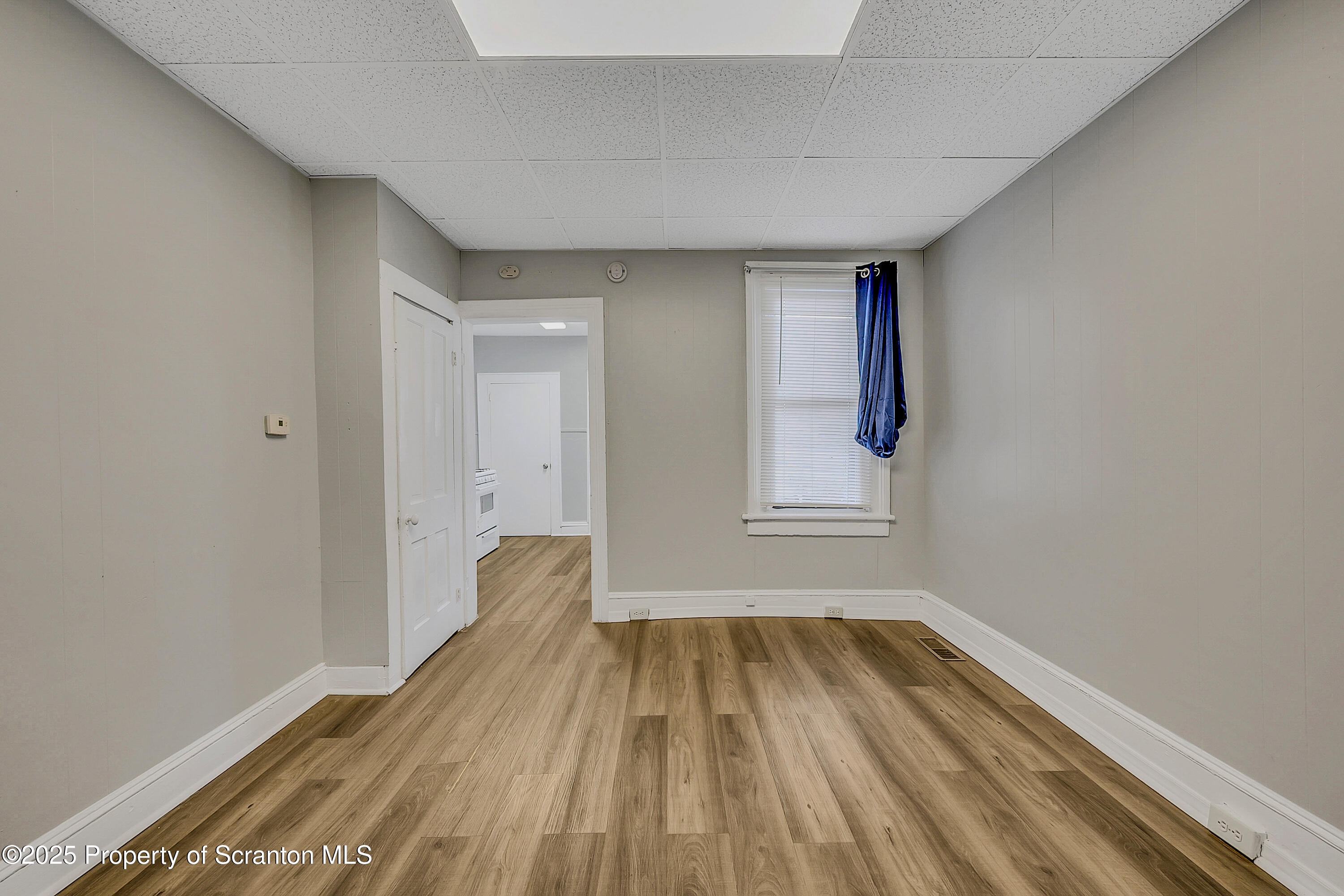 1007 Washburn Street, Unit 1 Scranton, PA 18504 - Photo 7 of 14 a view of wooden floor in a room