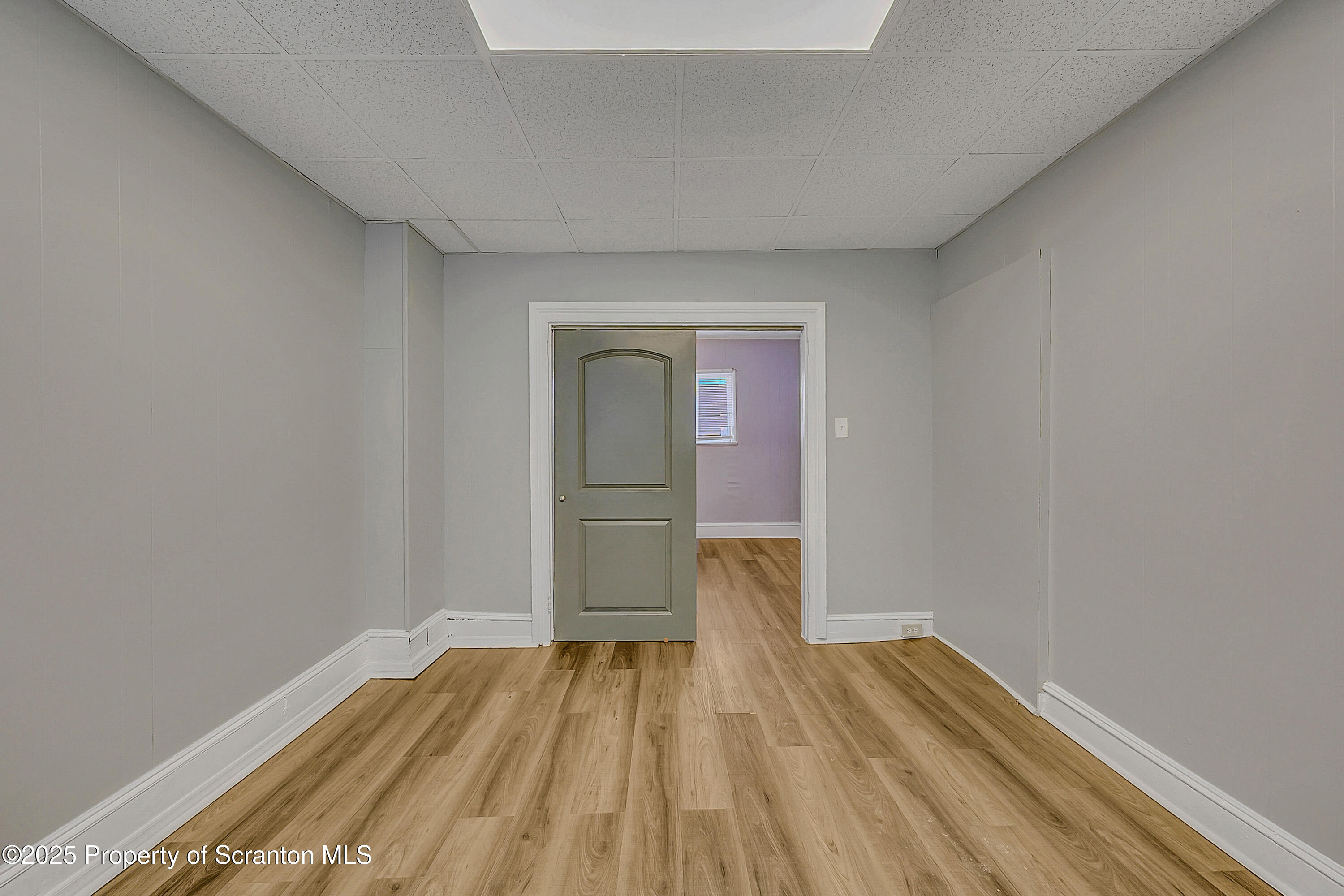 1007 Washburn Street, Unit 1 Scranton, PA 18504 - Photo 8 of 14 a view of a room with wooden floor
