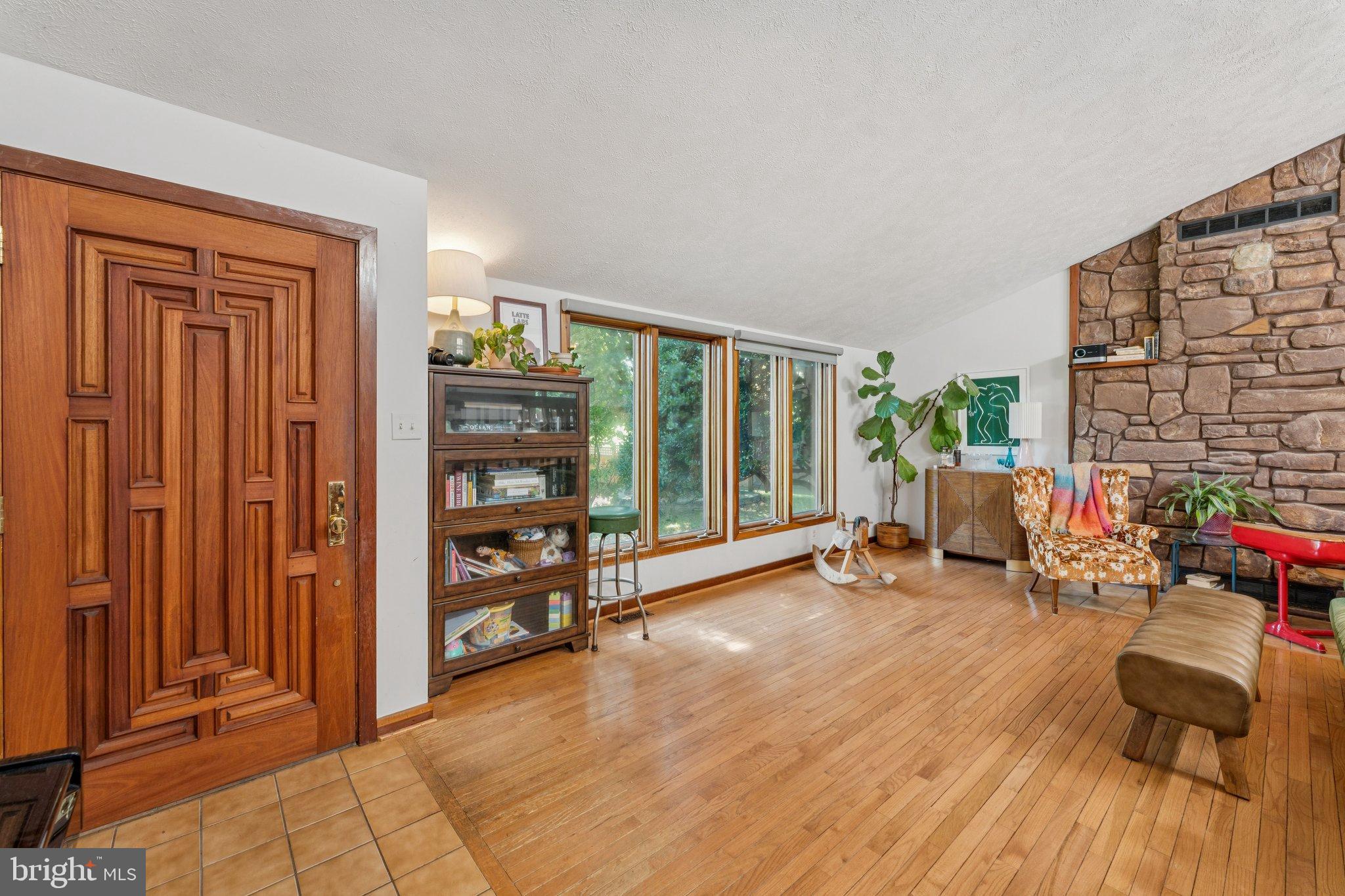 1684 Chain Bridge Road McLean, VA 22101 - Photo 2 of 23 a view of a livingroom with workspace and a window