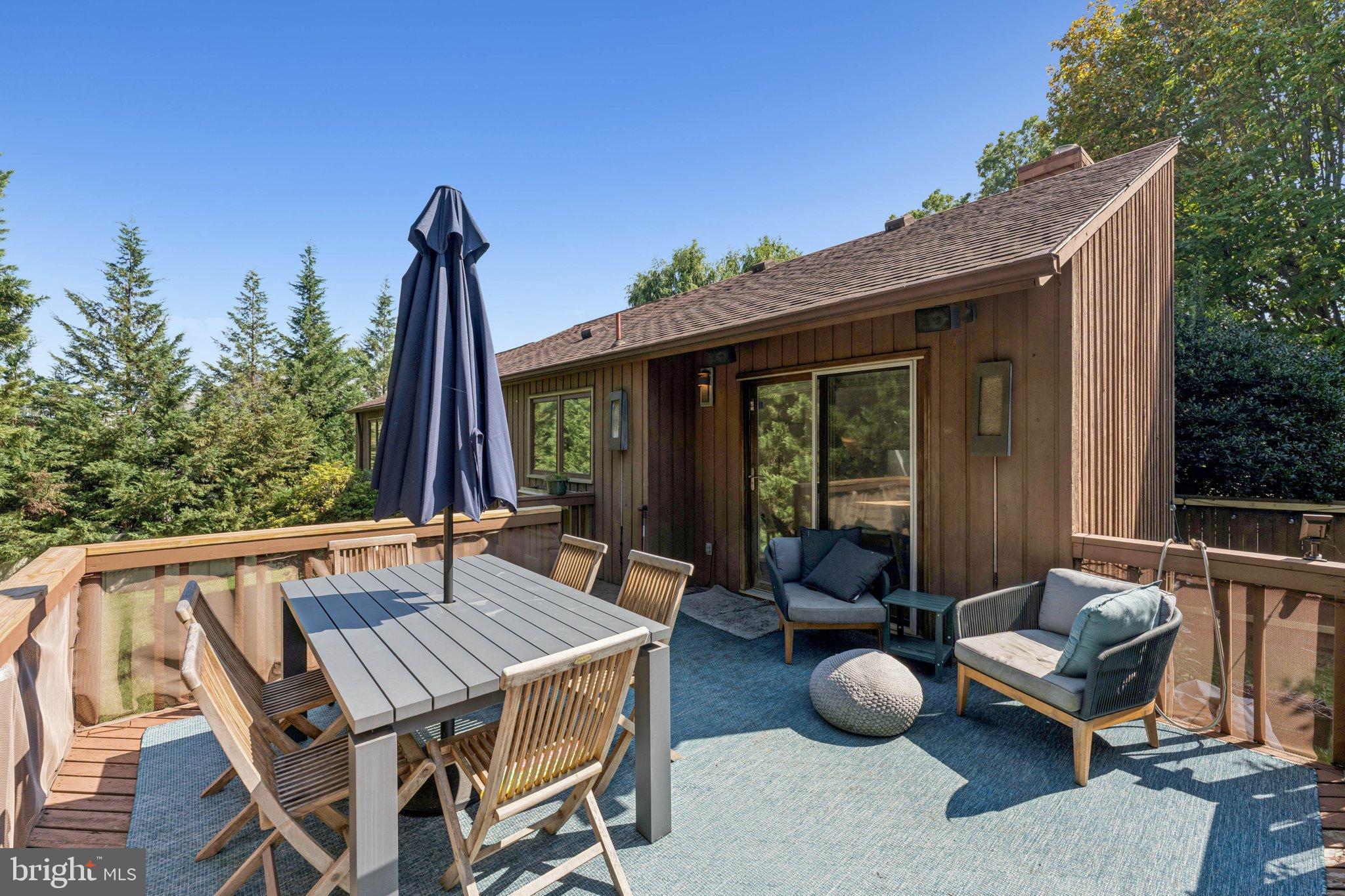 1684 Chain Bridge Road McLean, VA 22101 - Photo 8 of 23 a view of backyard with outdoor seating and plants